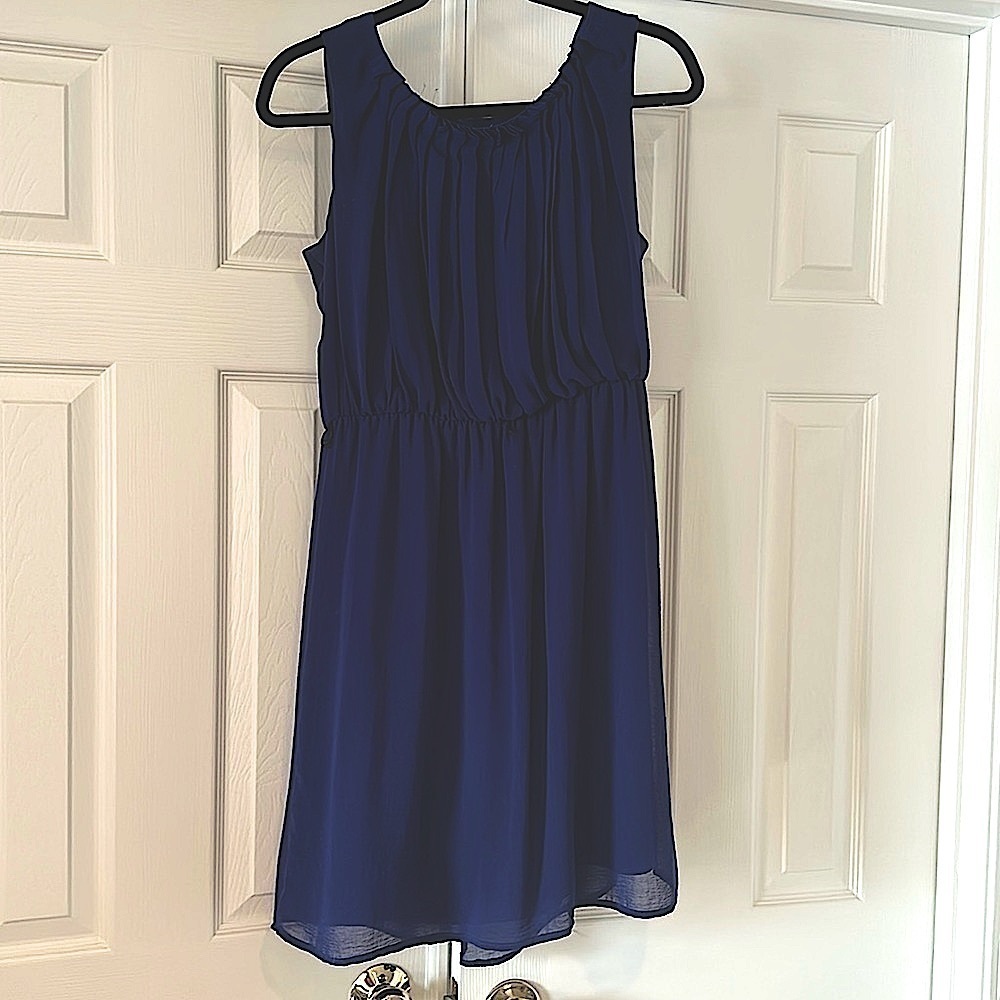 Royal blue chiffon dress with pleated front and gathered waist.
